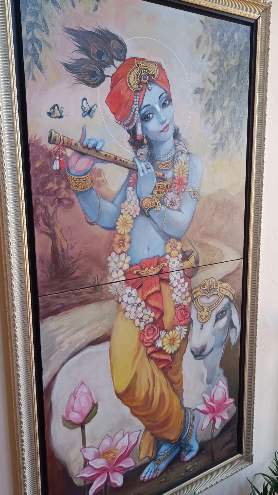 Śrī Krishna with His beloved cow — a devotional painting in the ashram