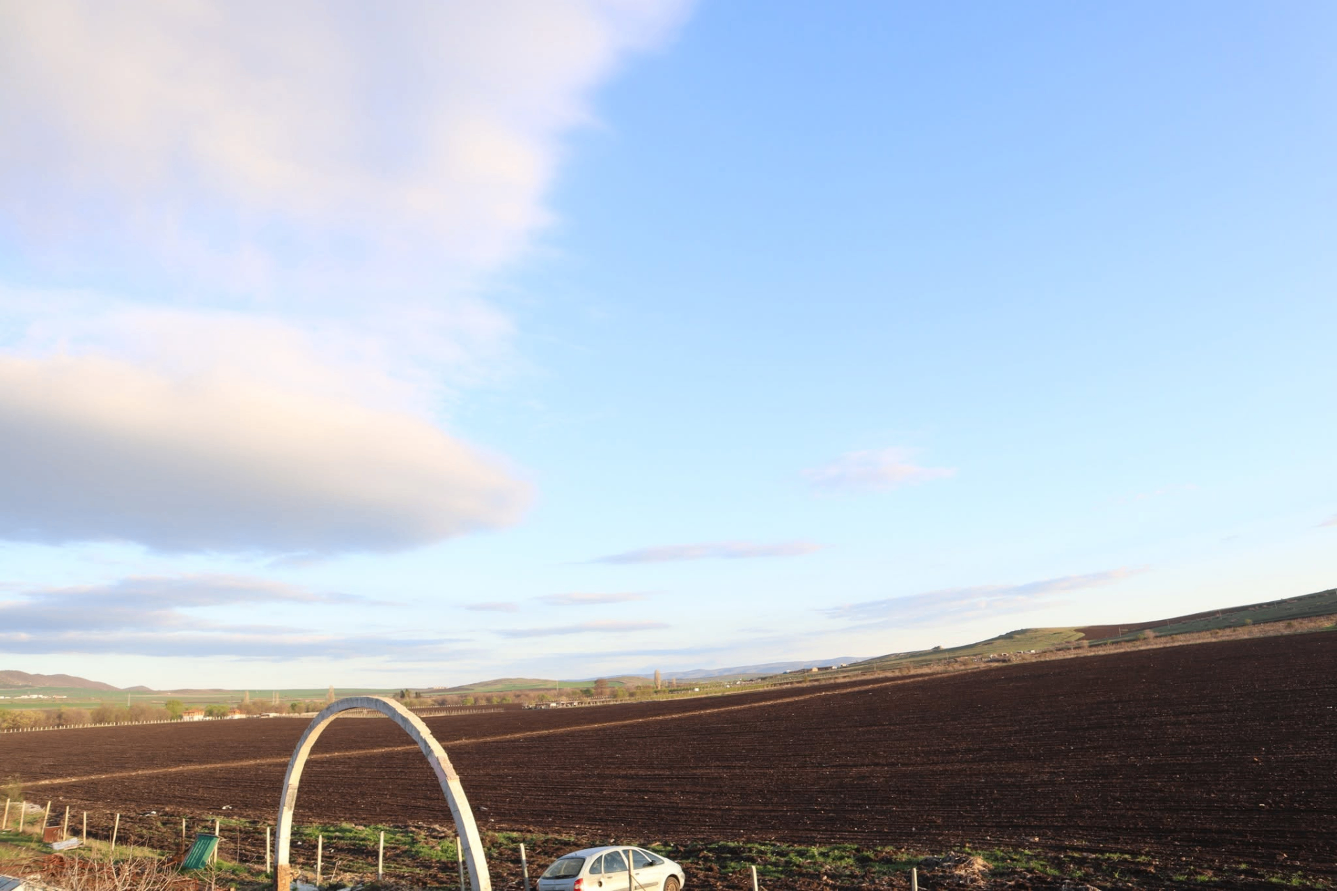Wide skies over the ploughed fields at first light